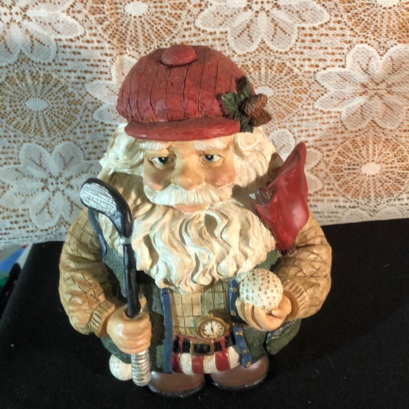 Santa Claude playing Golf